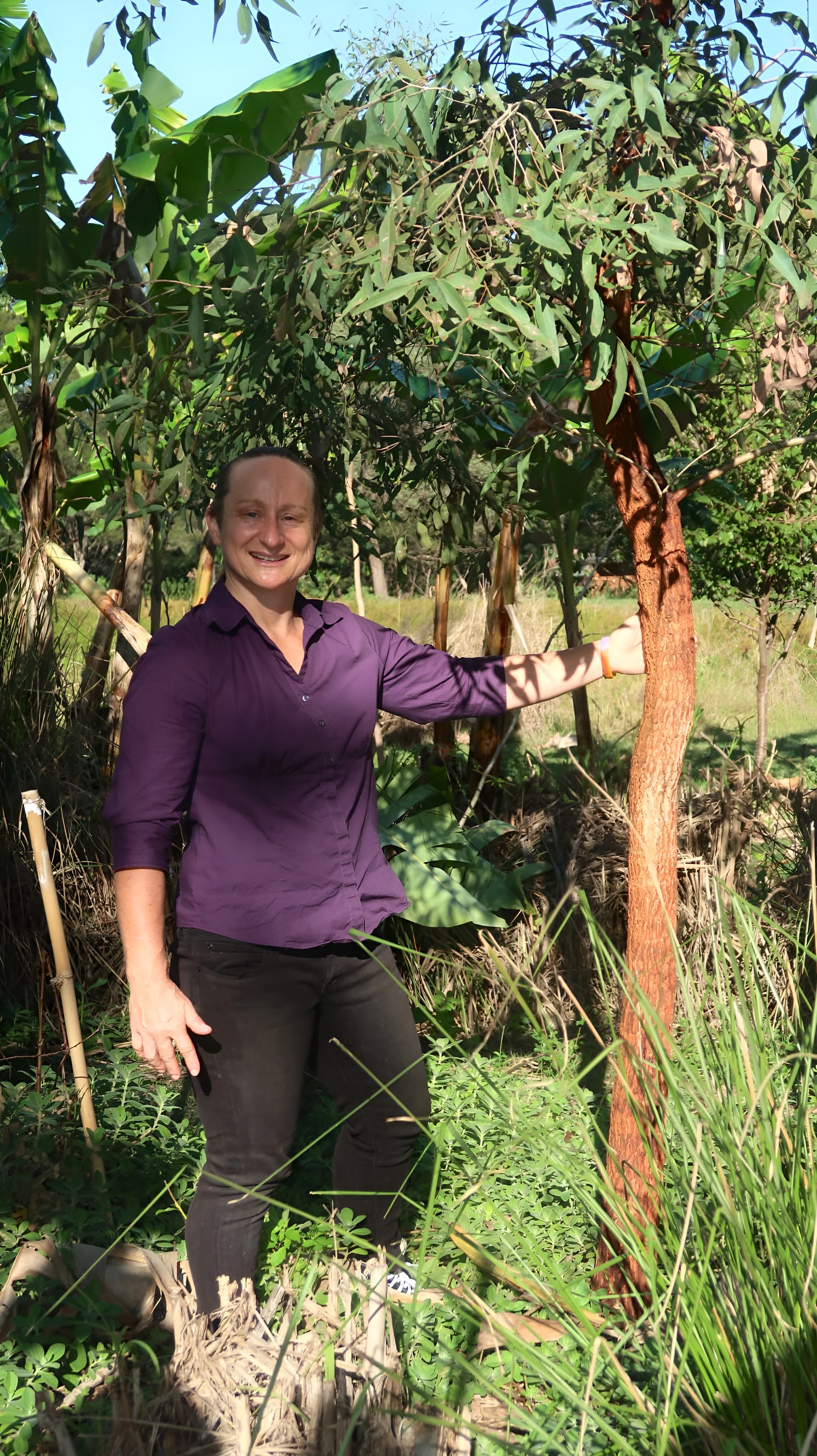 Thy with a thriving fruit tree at the Nourished Landscapes food forest, Jimboomba QLD