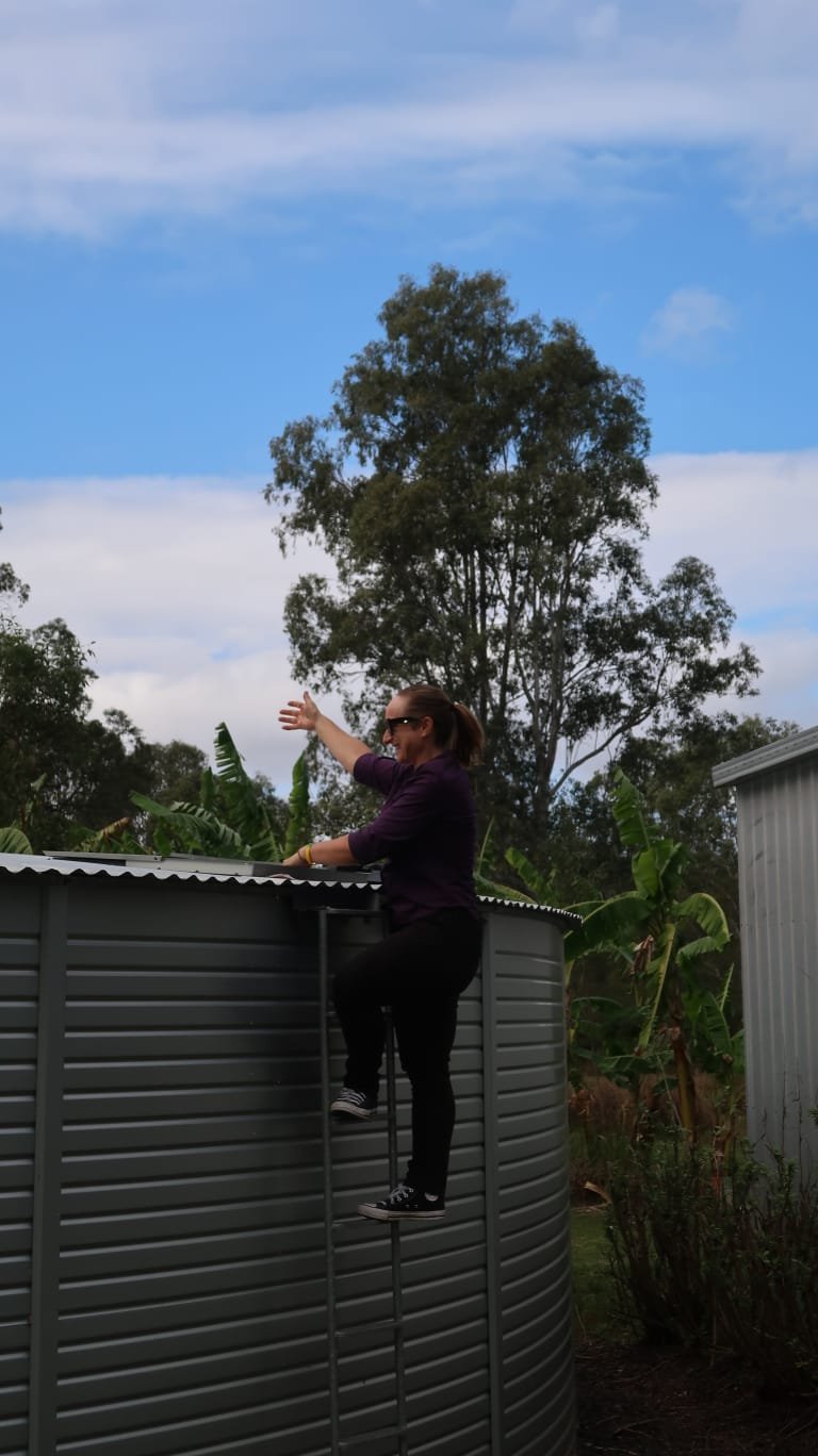 Water tank and property installation